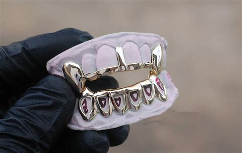 Grillz on fangs - Amazon.com: Fang Grillz 1-48 of 340 results for "fang grillz" Results Price and other details may vary based on product size and color. +1 color/pattern OOCC 18k Gold …